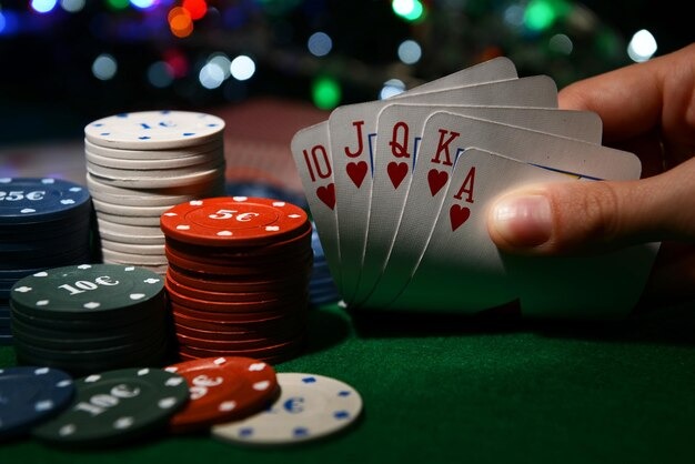 Live dealer dealing cards at Infinite Blackjack table